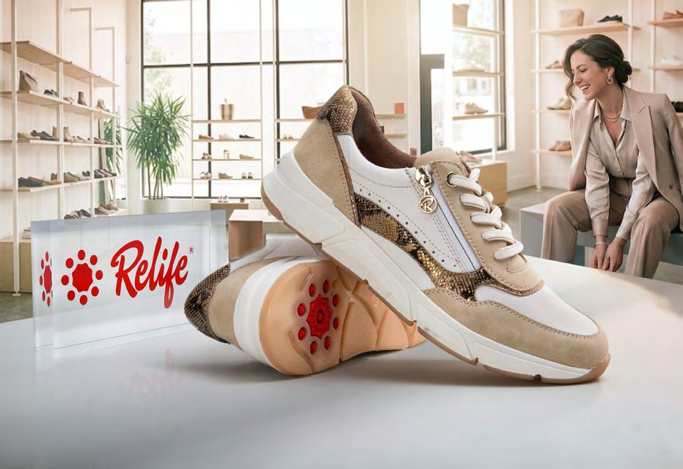 A Relife shoe on display in a store, beside a Relife logo block